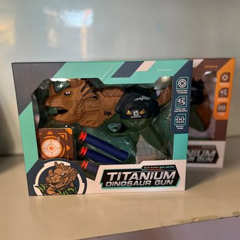 Dinosaurier Pistole mit Pfeilen & Zielscheibe - Geschenkbox (2er-Set)
