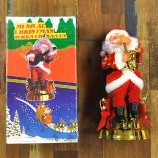 Beweglicher Weihnachtsmann mit Saxophon (2 Stk.)
